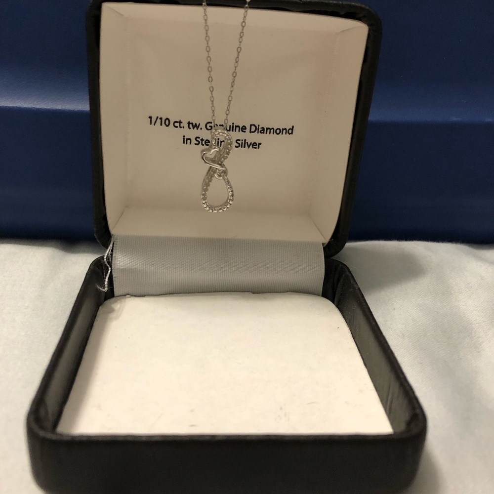 Infinity pendant with heart.